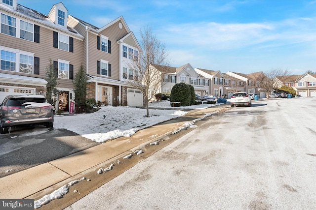 view of street with curbs, sidewalks, and a residential view