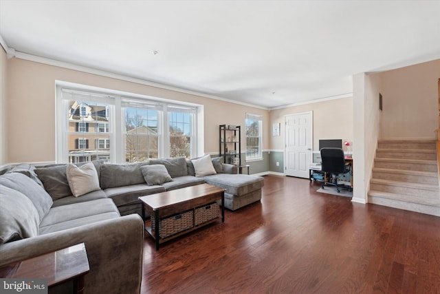 living room with stairs, ornamental molding, dark wood-style flooring, and baseboards