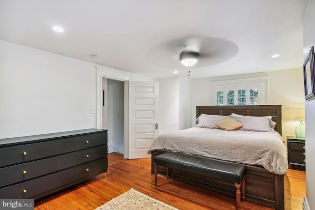 bedroom featuring ceiling fan and light wood-type flooring