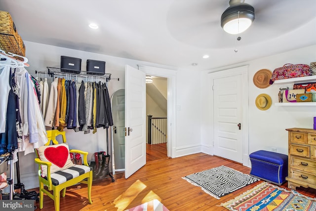 bedroom featuring ceiling fan and hardwood / wood-style floors