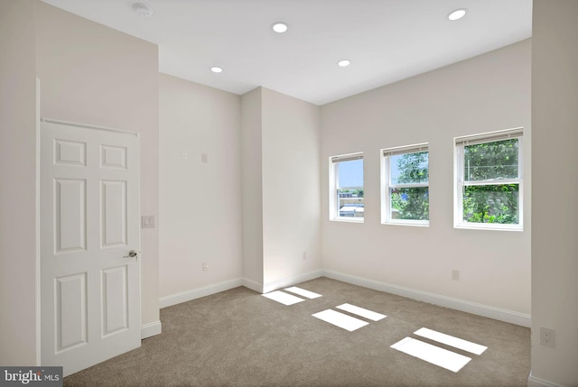 view of carpeted spare room