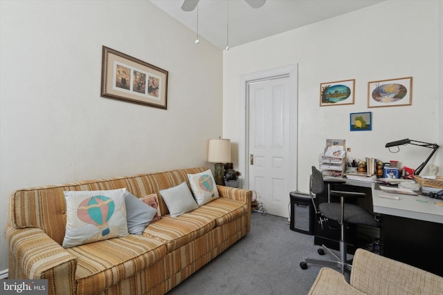 office area featuring carpet flooring, vaulted ceiling, and ceiling fan