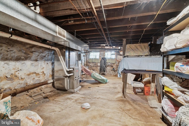 basement with heating unit