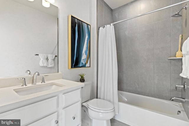 full bathroom with vanity, toilet, and shower / bath combo with shower curtain