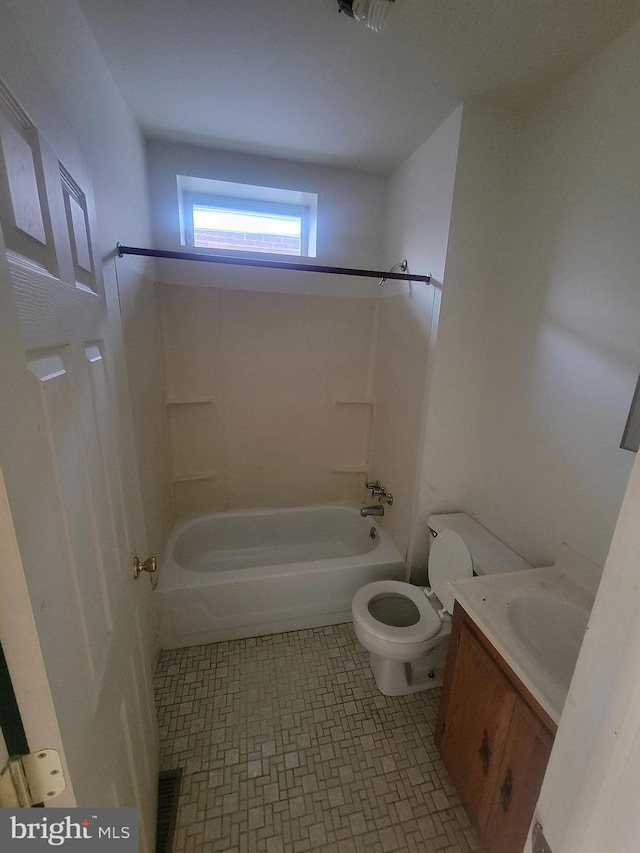 full bathroom with vanity, shower / bathtub combination, and toilet