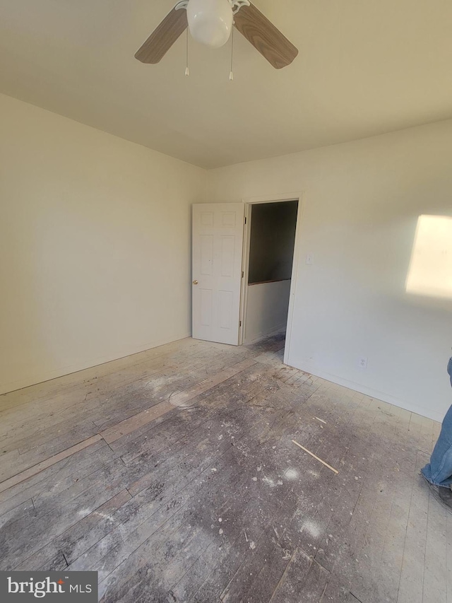 spare room with ceiling fan