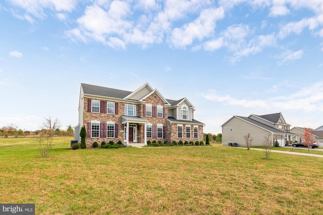 view of front of home with a front lawn