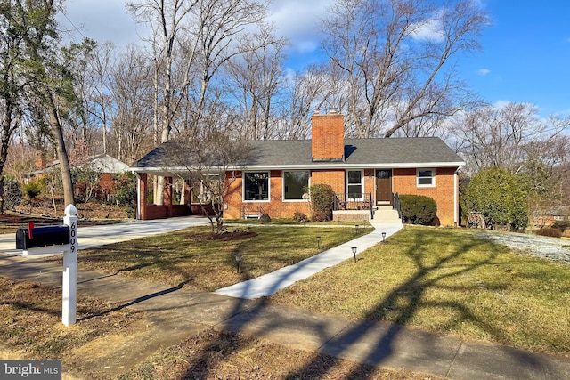 ranch-style home with a carport and a front lawn