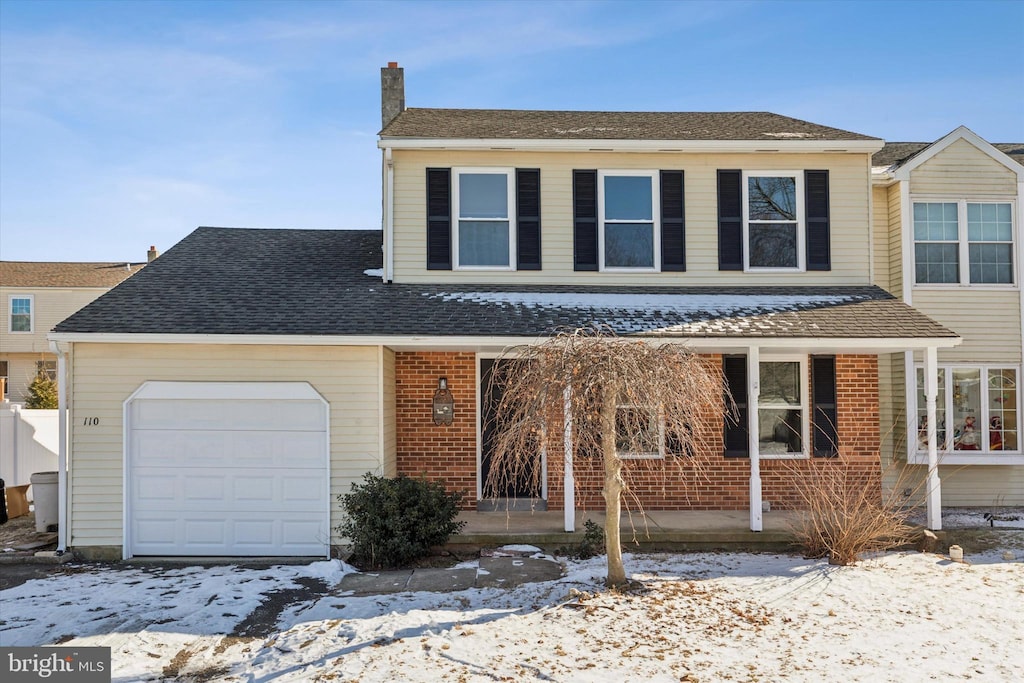 view of front property with a garage