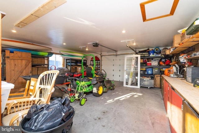 garage featuring a garage door opener