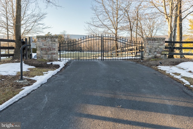 view of snow covered gate