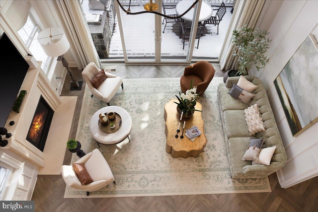 living room featuring dark parquet floors