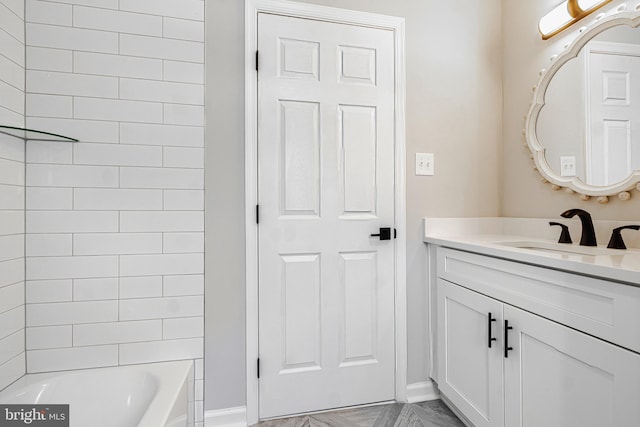 bathroom featuring vanity and bathing tub / shower combination