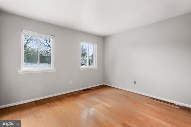 empty room featuring light hardwood / wood-style flooring