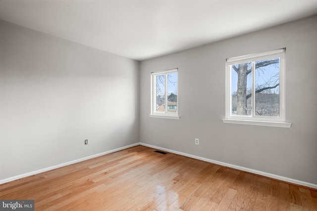 empty room featuring light hardwood / wood-style floors