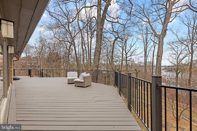 wooden deck with outdoor lounge area