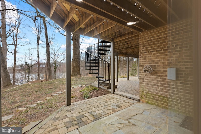 view of patio / terrace with stairway