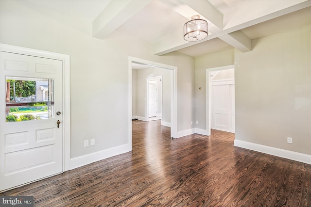 foyer with beamed ceiling, a notable chandelier, and dark hardwood / wood-style flooring