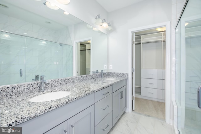 bathroom featuring vanity and walk in shower