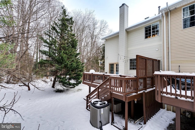 view of snow covered deck