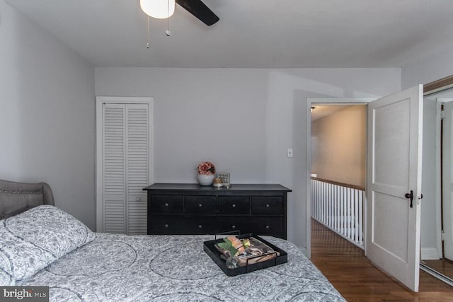 bedroom with ceiling fan and dark hardwood / wood-style flooring