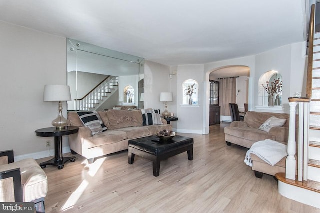 living room with light hardwood / wood-style flooring