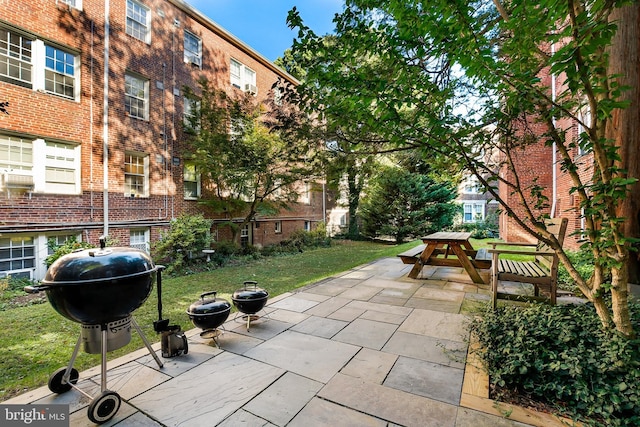 view of patio with a grill