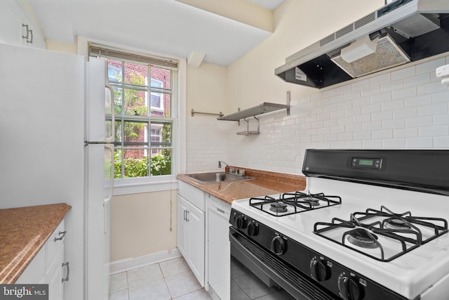 kitchen with range hood, white cabinets, white appliances, and sink