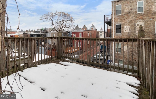 view of snow covered deck