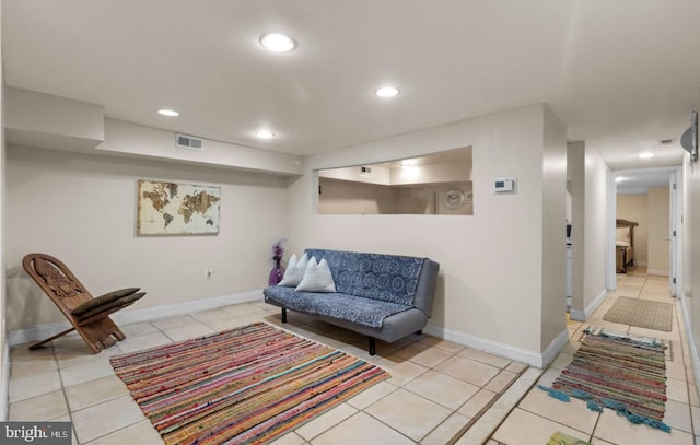 living room featuring light tile patterned flooring