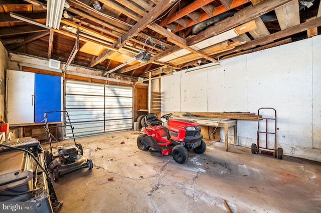 garage featuring a garage door opener