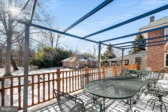 view of snow covered deck