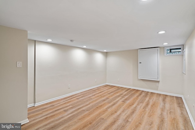 basement with light wood-type flooring