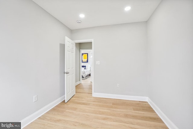 unfurnished room featuring light hardwood / wood-style floors