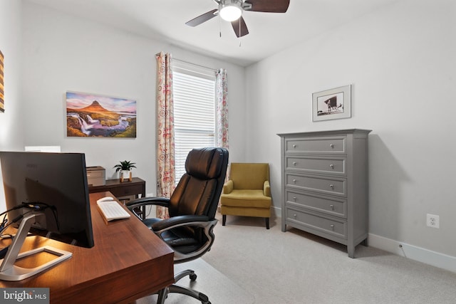 carpeted office with ceiling fan