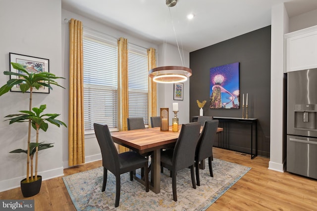 dining area featuring light hardwood / wood-style floors