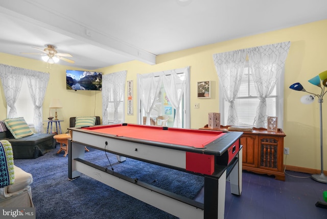 recreation room with beam ceiling, dark hardwood / wood-style flooring, ceiling fan, and billiards