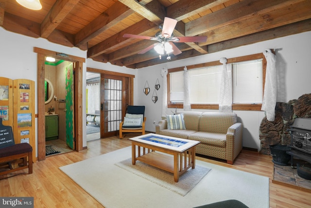 living room with beam ceiling, light hardwood / wood-style floors, ceiling fan, and wooden ceiling