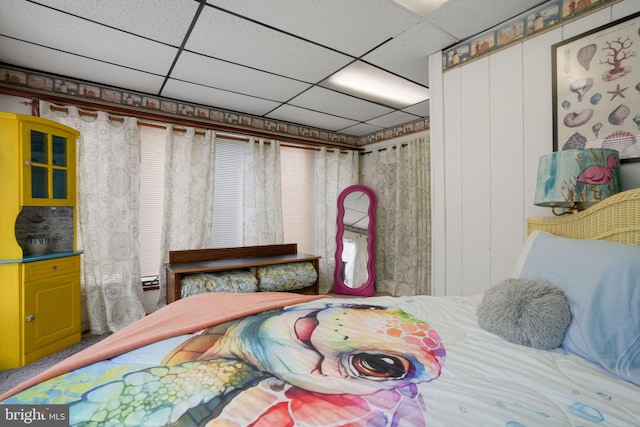 bedroom with a paneled ceiling