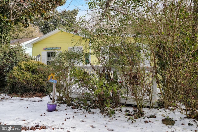 view of snow covered property