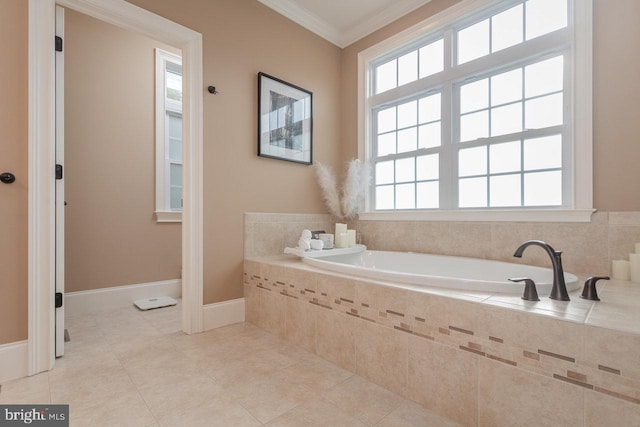 bathroom featuring tile patterned flooring, a relaxing tiled tub, and ornamental molding