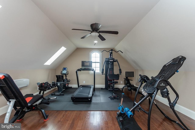 workout area featuring dark hardwood / wood-style floors, ceiling fan, and lofted ceiling