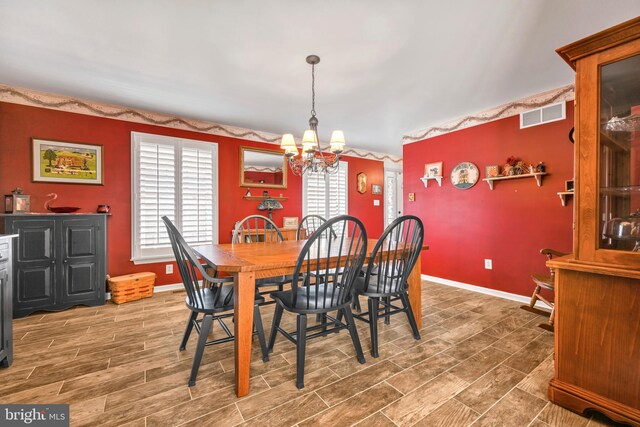 dining room with an inviting chandelier