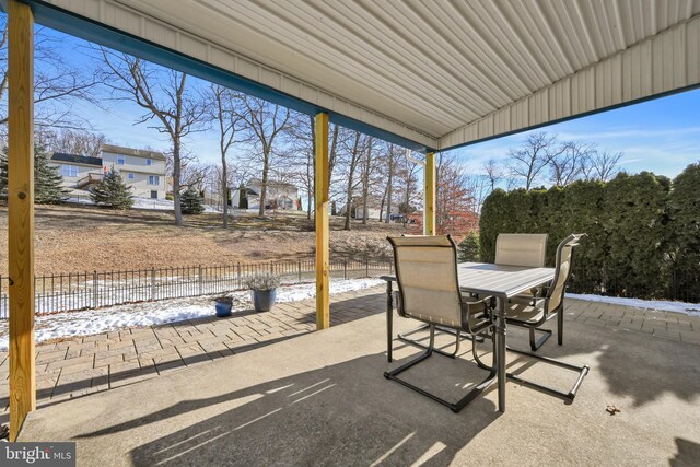 view of snow covered patio