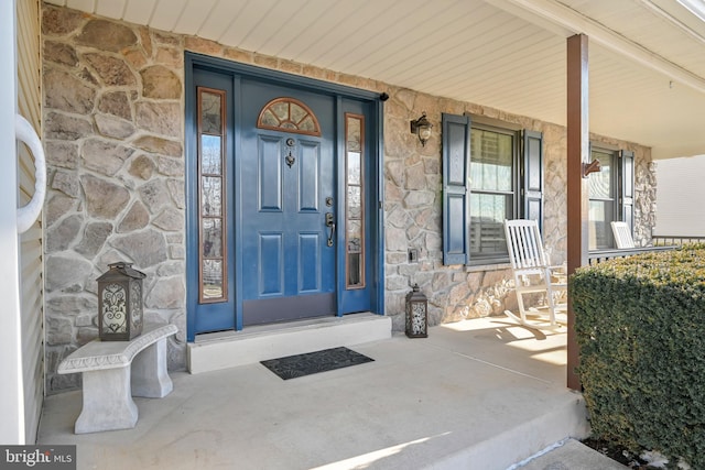 property entrance with a porch