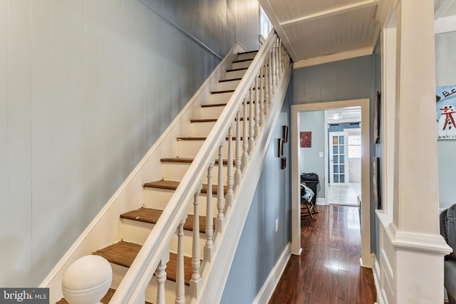 staircase featuring hardwood / wood-style flooring