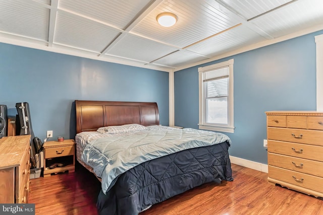 bedroom with hardwood / wood-style flooring