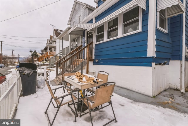 view of snow covered patio