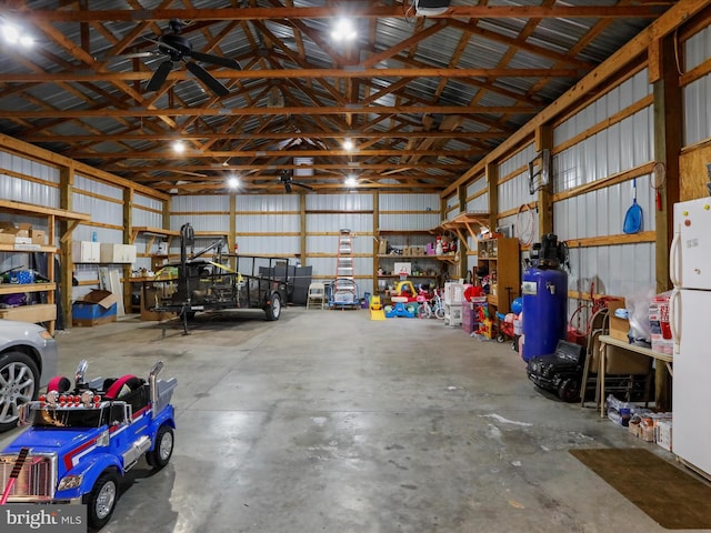 garage featuring white fridge