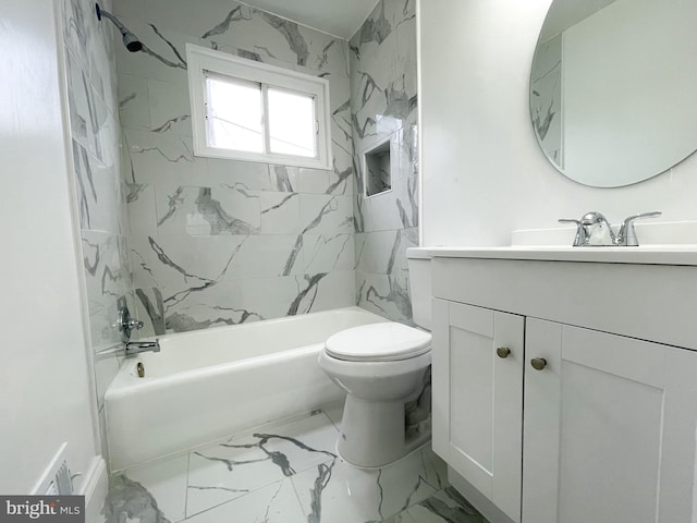 full bathroom featuring vanity, toilet, and tiled shower / bath combo